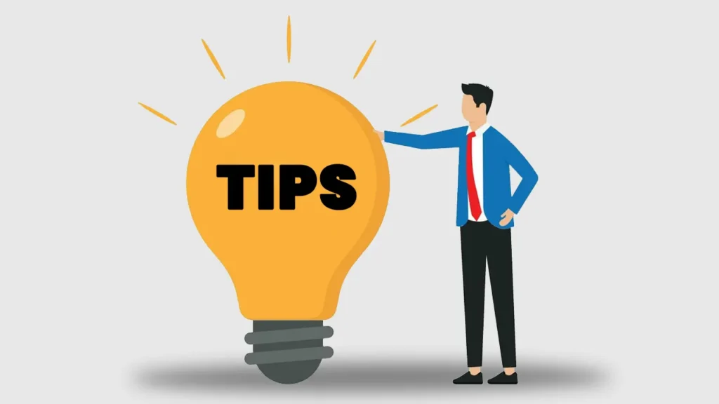Illustration of a man pointing to a glowing lightbulb labeled “TIPS,” symbolizing practical advice for reducing video production costs using templates, AI tools, stock assets, and strategic planning.